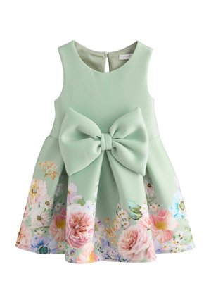 Light green dress with a flared skirt, featuring a large bow at the waist and a floral print at the hem in pink and blue tones.