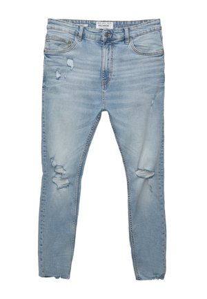 Jeans azzurri chiari con effetto vissuto, dotati di una vestibilità slim, con numerosi strappi e orlo sfrangiato per un aspetto consumato. Tessuto in cotone, design a cinque tasche.