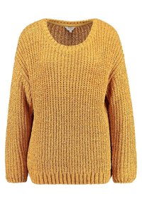 Knitted sweater in mustard yellow, featuring a wide scoop neck, long sleeves, and ribbed hem, with a loose, textured fabric.