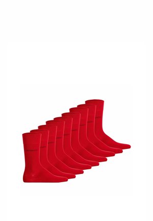 Zehn Paar rote mid-calf Socken, diagonal angeordnet, jeweils mit kleinem schwarzem Logo am Knöchel.