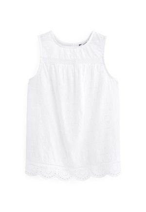 Blouse blanche sans manches avec col rond, broderie anglaise et détail d'ourlet festonné.