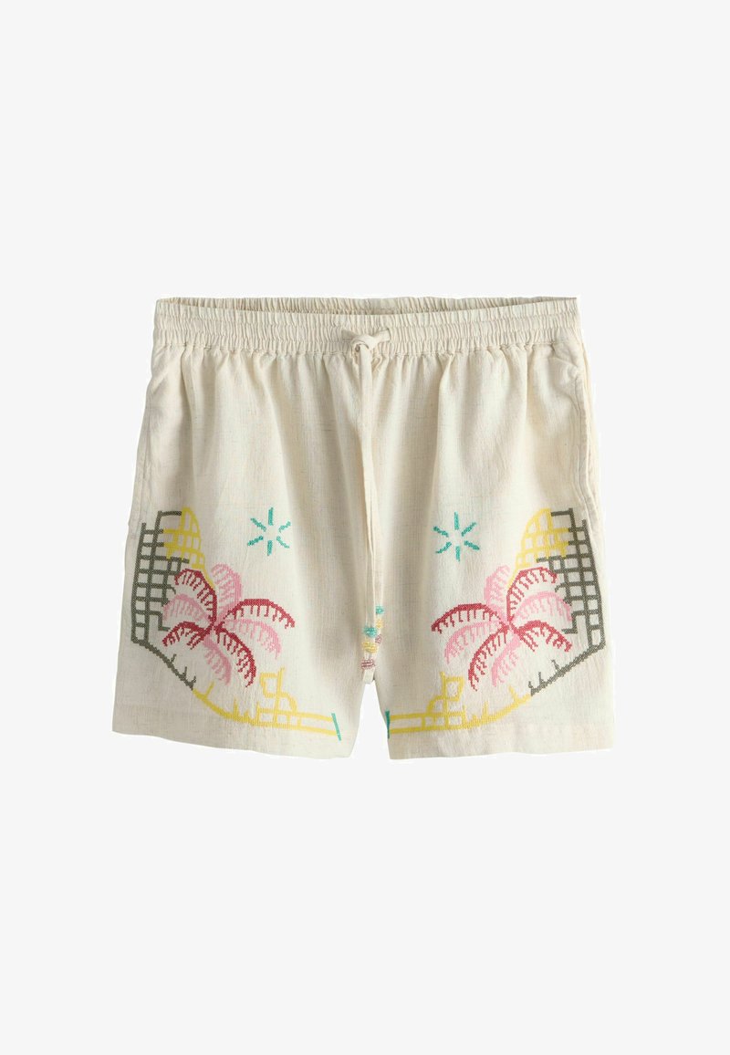 Beige shorts med snørehæl, broderede lyserøde og røde palmer, gule geometriske figurer og blågrønne stjerneagtige accenter på hvert ben.