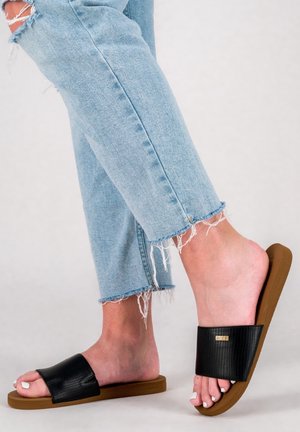Platt slip-in - black
