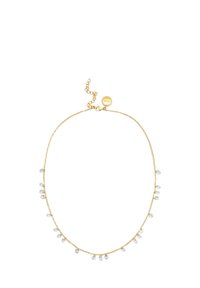 Collier en chaîne dorée avec des accents en goutte d'eau argentés, longueur ajustable avec un fermoir et une chaîne d'extension, design minimaliste.