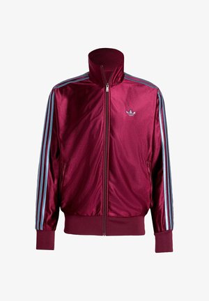 Burgundy satin bomber jacket with a high collar, blue side stripes, and zip front closure. Features an embroidered logo on the chest.