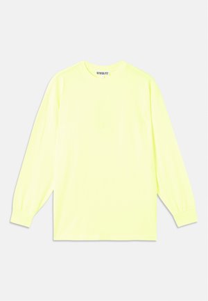 Long-sleeve t-shirt in bright neon yellow. Made of smooth fabric, features a crew neck and elasticized cuffs. Brand name subtly printed on front.