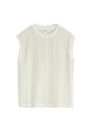 Débardeur tricoté blanc sans manches avec un motif en maille texturé, présentant des rayures verticales et un col rond. Matériau léger et respirant.