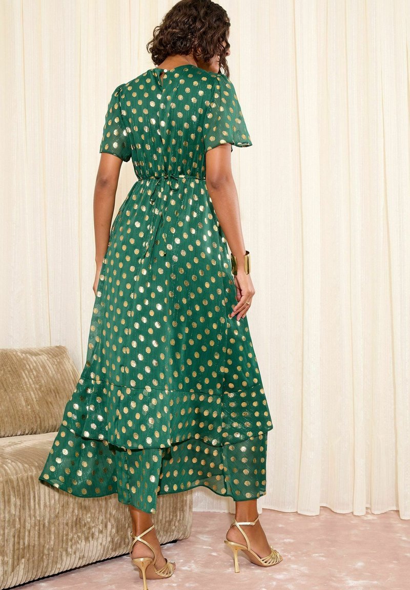 slim fit dress slacks Fiona Emerald Green Gold Foil Frill Hem Dress