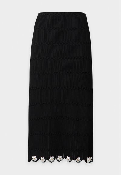 Jupe noire longueur genou avec motif vertical texturé et ourlet festonné orné d'embellissements floraux en perles et strass.