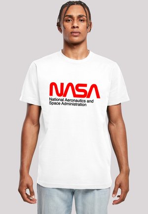 White cotton t-shirt featuring a red "NASA" logo and full name in black. Short sleeves and a crew neck design. Light, comfortable fabric.