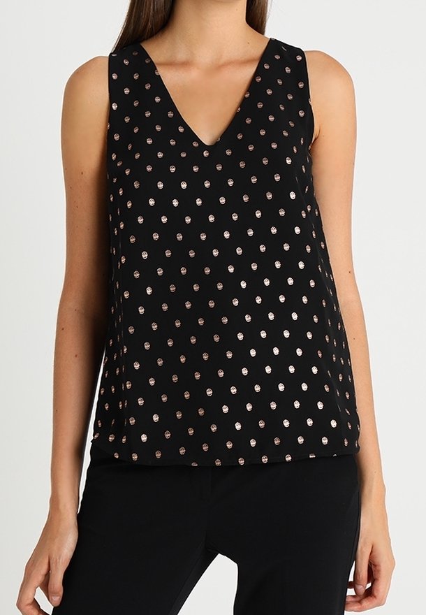 Haut sans manches noir avec un col en V, orné de pois couleur or rose sur toute la surface, fabriqué dans un tissu lisse avec une coupe décontractée.