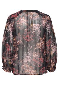 Durchsichtige schwarze Bluse mit floralem Muster in Lila, Rot und Gelb. Sie hat lange Puffärmel und Raffung an den Ärmelbündchen sowie am Rücken.