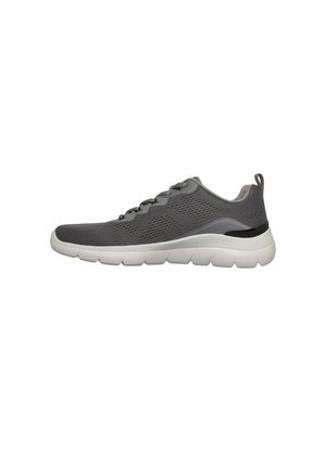 Scarpa da ginnastica grigia con tomaia in mesh traspirante, design con lacci, suola spessa bianca imbottita e linguetta sul tallone, mostrata di lato.