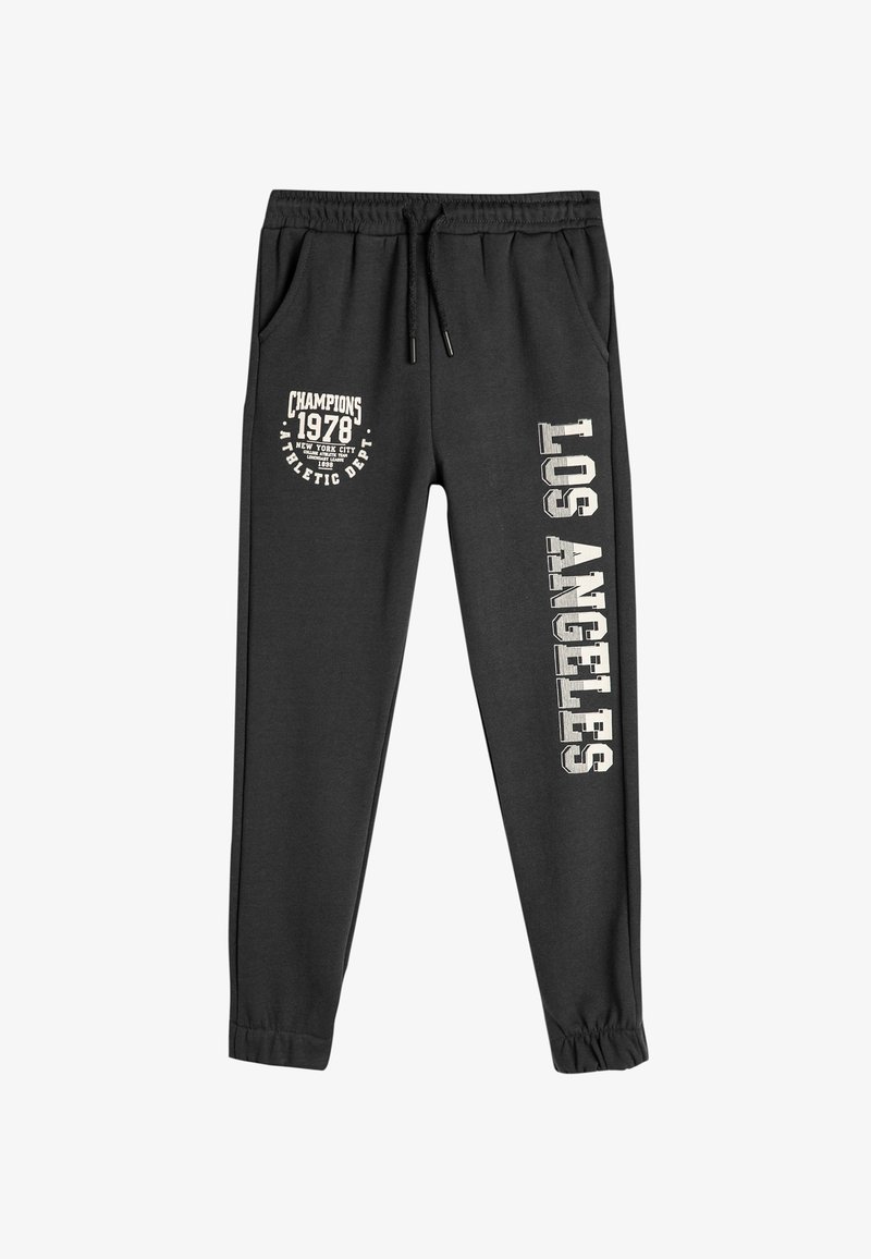 Black sweatpants made of cotton blend. Feature elastic waistband, side pockets, and printed designs: "Champions 1978" and "Los Angeles."