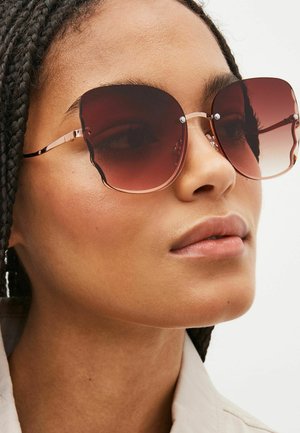 Next RIMLESS - Ochelari de soare - rose gold