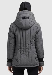 Gray puffer jacket with a quilted design, large hood, and black accents. Ribbed cuffs and logo detail at the neck. Smooth texture.