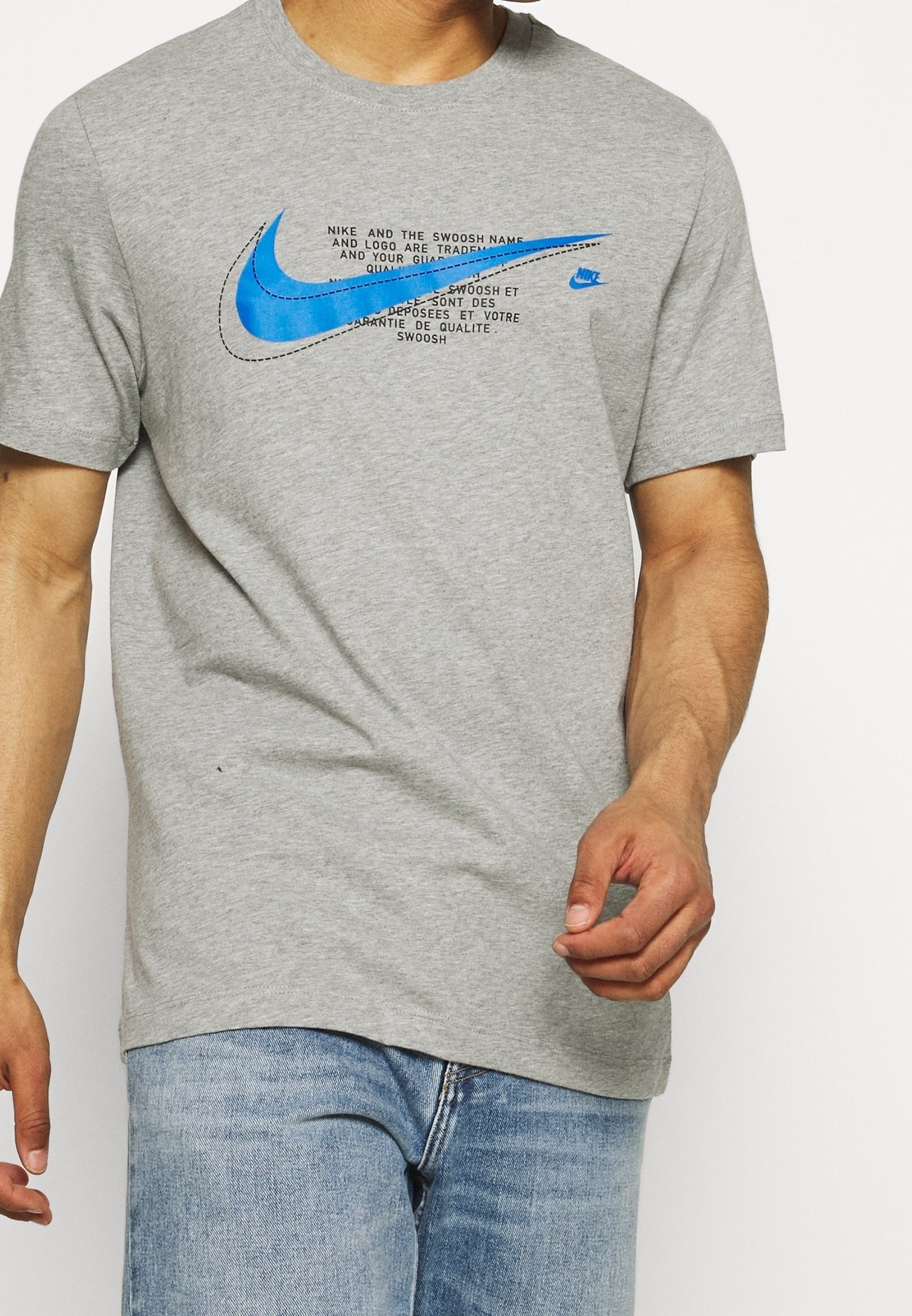 blue and gray nike shirt