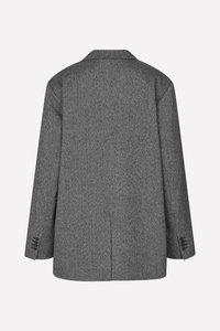 Blazer gris texturé avec un col cranté, des manches longues et des poignets à quatre boutons. Présente une fente centrale à l'arrière.