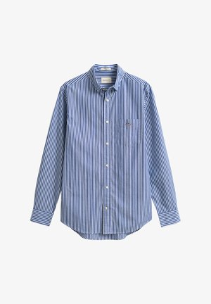 Blå og hvit, vertikalt stripete skjorte med lange ermer, knappet krage, enkelt frontlomme og avrundet nede. Glatt bomullsstoff.
