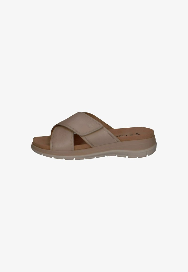 Light beige cross-strap slide sandal with a smooth leather upper, cushioned insole, and a lightweight rubber outsole.