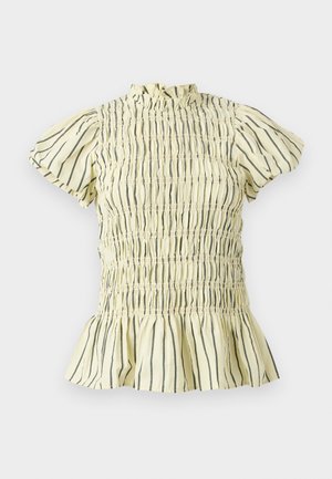 Κρεμ μπλούζα με κοντά μανίκια, μαύρες κάθετες ρίγες, ραμμένο μπούστο, βολάν στην ψηλή λαιμόκοψη και καμπυλωτό τελείωμα.