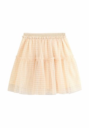 Falda en estampado de cuadros en tonos melocotón claro y blanco con un diseño de capas y volantes. Cintura elástica con una banda sutilmente brillosa. Textura transparente, forma acampanada.