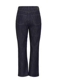 Dark denim jeans with a straight cut, two back pockets, visible stitching, and a textured finish. Features a black logo patch on the waistband.