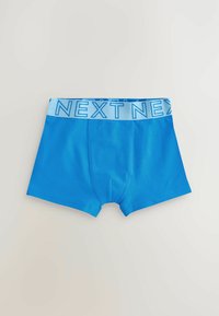 Boxers pour hommes bleus en tissu doux, avec une taille élastique bleu clair sur laquelle est imprimé "NEXT" en caractères gras.