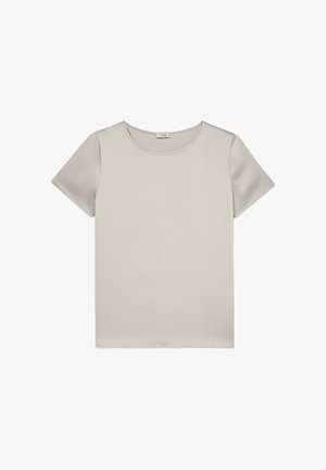 Top cu manșă scurtă în bej deschis, textură fină, guler rotund, design simplu, fără modele sau embellishments, realizat dintr-un material moale.