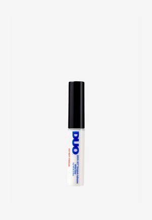 White adhesive tube with black cap. Blue and red text reads "DUO QUICK-SET StripBash Adhesive." 15ml size indicated on label.