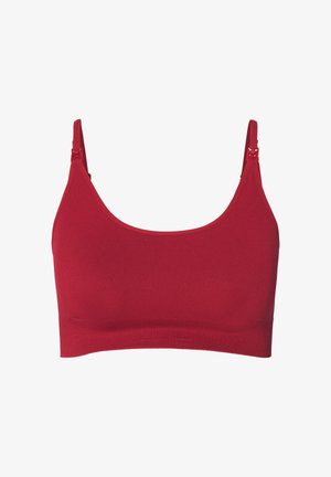 Bralette rouge côtelée avec fines bretelles réglables, texture douce et design sans coutures, dotée d'une large bande pour un bon maintien.