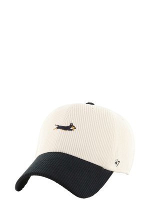 Two-tone corduroy baseball cap with cream crown, black curved brim, and embroidered small black and brown dachshund dog on front.