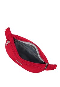 Riñonera de tela roja con una textura suave, cierre de cremallera y un forro interior gris. Incluye un pequeño bolsillo con cremallera en el interior.