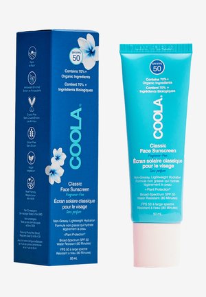 Coola Classic Gesichtssonnencreme, SPF 50, in einer türkisfarbenen Tube mit weißem Text. Die Verpackung zeigt florale Grafiken und umweltfreundliche Symbole.