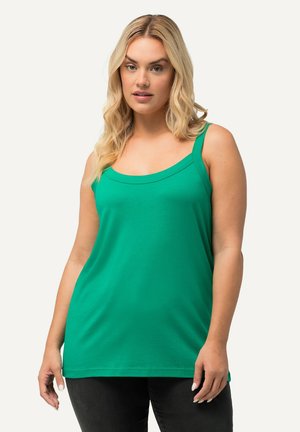 Top senza maniche verde in un morbido misto cotone. Presenta un ampio scollo a barca e una vestibilità rilassata che arriva ai fianchi.