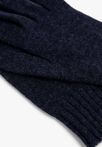 Guantes de punto en azul marino oscuro, con una textura suave, puño acanalado y un diseño plegado para mayor calidez y comodidad.