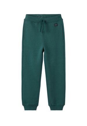 Vihreät puuvillahousut naru vyötäröllä, ribbausvarret, sivutaskut ja logotunnus vyötäröllä. Suora pinta.
