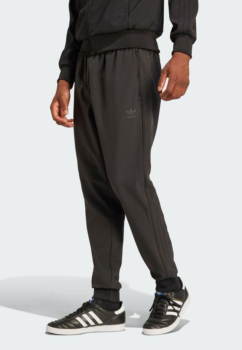 adidas Originals - BONDED SUPERSTAR TRACK - Tracksuit bottoms - black, Enlarge