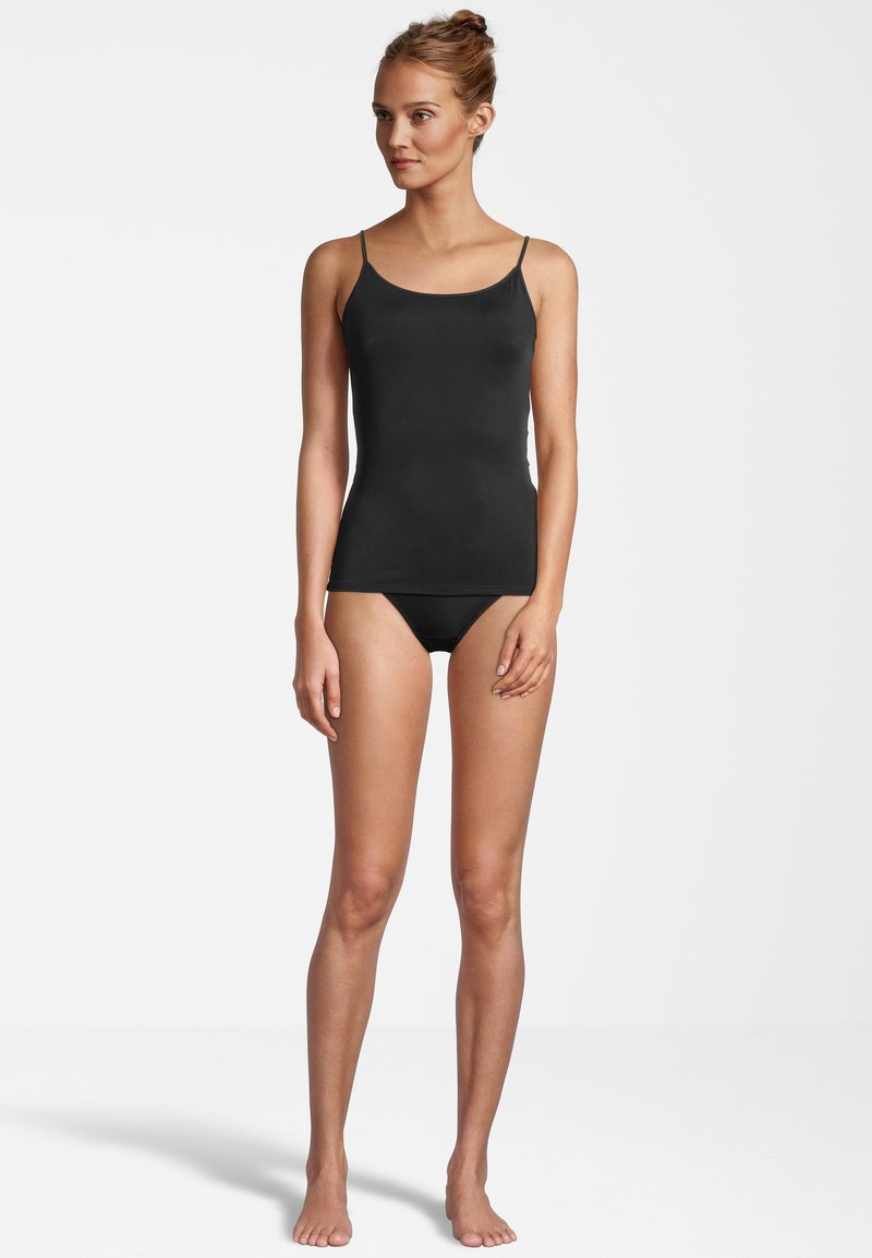 Black camisole top with thin straps, smooth texture, and fitted design, paired with matching black bikini bottoms. Simple and minimal.