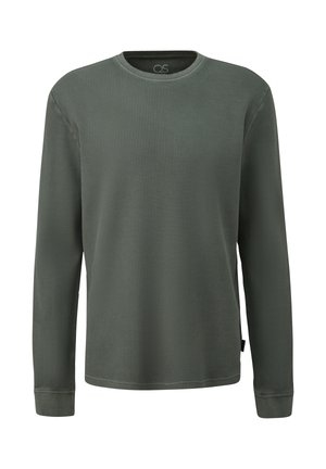 Grünes Langarmshirt aus Waffelstrick mit rundem Ausschnitt und gerippten Bündchen. Verfügt über eine dezente Struktur und ein kleines Logofähnchen an der Seite.