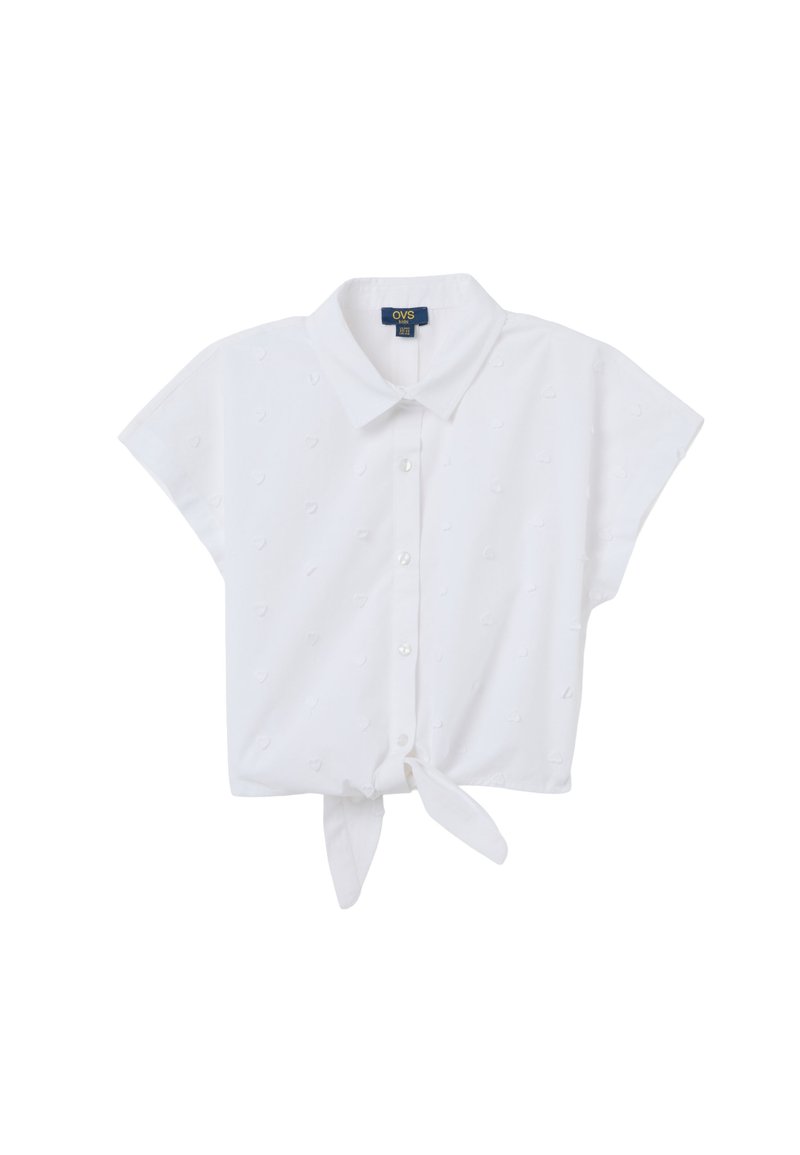 Witte korte mouwen blouse met kraag, voorzien van een striksluiting, een getextureerd stippenpatroon en knoopsluiting.