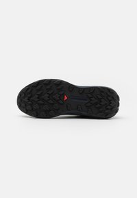 Salomon GENESIS - Scarpe da trail running - carbon/tahitian tide/quiet shade