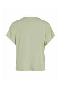 Maglietta a maniche corte di colore verde salvia realizzata in tessuto morbido con una vestibilità rilassata. Presenta un colletto rotondo e una superficie liscia e uniforme.