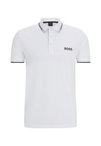 Camisa polo blanca de algodón con una tapeta de dos botones, ribete negro en el cuello y logo bordado en el lado izquierdo del pecho. Mangas cortas.