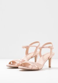 Menbur Sandaalit nilkkaremmillä - rose gold-coloured