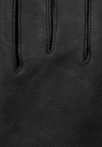 Black leather glove with a textured surface, featuring three finger openings and visible stitching along the edges.