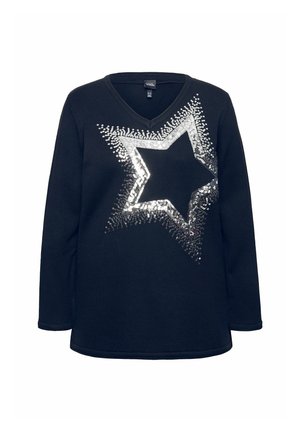 Maglione nero a maglia con scollatura a V e maniche lunghe, caratterizzato da un grande design di stella in paillettes argentate sulla parte anteriore. Tessuto texture.