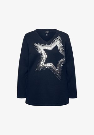Maglione nero a maglia con scollatura a V e maniche lunghe, caratterizzato da un grande design di stella in paillettes argentate sulla parte anteriore. Tessuto texture.