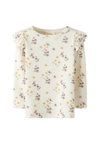 Długi rękaw, bluzka w kremowym, prążkowanym materiale, z żółtym i fioletowym wzorem kwiatowym, z falbaniastymi akcentami na ramionach oraz okrągłym dekoltem.