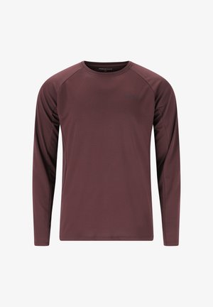 Chemise à manches longues de couleur bourgogne foncé, fabriquée en tissu lisse avec un col rond, des manches raglan et un logo subtil sur la poitrine.